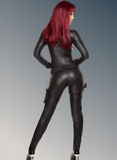 Person wearing a black leather outfit with red hair on a gray background