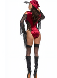 Woman wearing a red lingerie set with black sheer sleeves and stockings on a white background