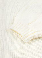 Close-up of a textured white fabric with a subtle pattern
