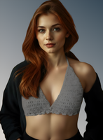 Woman wearing a gray bralette with a plain background