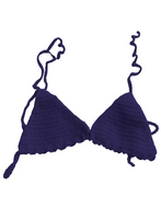 Purple bikini top on a white background