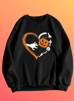 Black sweatshirt with Halloween-themed design on an orange background
