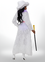 Person wearing a long white textured dress with a hood, holding a cane on a white background