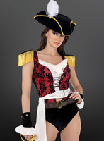 Woman in a pirate costume with a black hat and red and gold top against a gray background