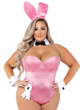 Person wearing a pink bunny costume with ears and a bodysuit on a white background