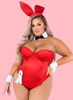 Person wearing a red bunny costume with a pink background